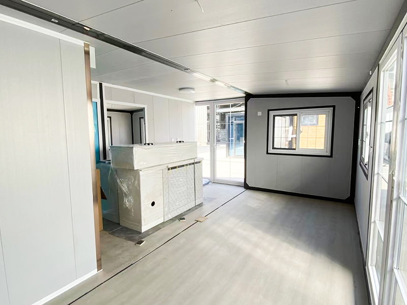 Camera container espandibile residenziale a doppia ala